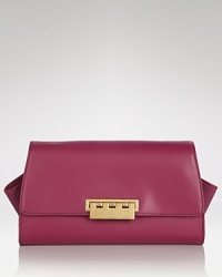 Explore the exotic with this Z Spoke Zac Posen shoulder bag. Its shoulder right shape is sleek, while a peek of python-printed leather lends a killer pop. Explore the exotic with this Z Spoke Zac Posen shoulder bag. Its shoulder right shape is sleek, while a peek of python-printed leather lends a killer pop.