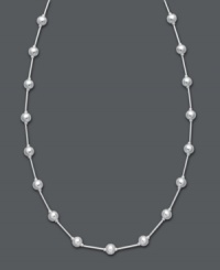 A simple layer that adds polish and shine. Giani Bernini's station necklace features shiny beads strung from a delicate chain. Crafted in sterling silver. Approximate length: 16 inches + 3-inch extender. A simple layer that adds polish and shine. Giani Bernini's station necklace features shiny beads strung from a delicate chain. Crafted in sterling silver. Approximate length: 16 inches + 3-inch extender.