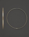 A graceful hoop with invisible closure to create a perfectly elegant orb to complement your most refined ensembles. Designed by Lana.