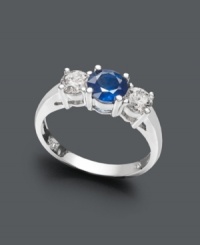 This sparkling, yet subtle, ring adds sophistication to any look. Crafted in 14k white gold, a three-stone design highlights a round-cut sapphire center stone (1 ct. t.w.) and two diamond side stones (5/8 ct. t.w.). This sparkling, yet subtle, ring adds sophistication to any look. Crafted in 14k white gold, a three-stone design highlights a round-cut sapphire center stone (1 ct. t.w.) and two diamond side stones (5/8 ct. t.w.).