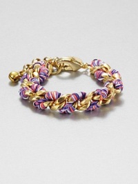 A radiant link chain wrapped with multi-colored thread for a truly unique and colorful style. Polyester threadGoldtone brassLength, about 6Lobster clasp closureMade in USA A radiant link chain wrapped with multi-colored thread for a truly unique and colorful style. Polyester threadGoldtone brassLength, about 6Lobster clasp closureMade in USA