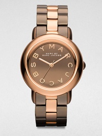 A rich brown and rose goldtone ion-plated stainless steel timepiece with logo markers. Quartz movementWater resistant to 5 ATMRound rose goldtone ion-plated stainless steel case, 36mm (1.4)Smooth bezelBrown mirror dialLogo hour markersSecond hand Two-tone stainless steel link braceletImported A rich brown and rose goldtone ion-plated stainless steel timepiece with logo markers. Quartz movementWater resistant to 5 ATMRound rose goldtone ion-plated stainless steel case, 36mm (1.4)Smooth bezelBrown mirror dialLogo hour markersSecond hand Two-tone stainless steel link braceletImported