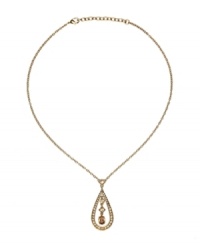 Simple enough for every day, gorgeous enough to make you feel stunning. Monet's warm goldtone necklace features a crystal-accented teardrop pendant surrounding three unique cuts of golden, topaz-colored crystal. Crafted in mixed metal. Approximate length: 16 inches + 2-inch extender. Approximate drop: 2 inches. Simple enough for every day, gorgeous enough to make you feel stunning. Monet's warm goldtone necklace features a crystal-accented teardrop pendant surrounding three unique cuts of golden, topaz-colored crystal. Crafted in mixed metal. Approximate length: 16 inches + 2-inch extender. Approximate drop: 2 inches.