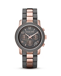 Grey is brightened with on-trend rose-gold tone in this sleek and contemporary timepiece from MICHAEL Michael Kors. Grey is brightened with on-trend rose-gold tone in this sleek and contemporary timepiece from MICHAEL Michael Kors.