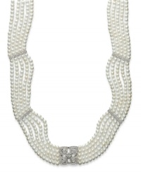Five rows of elegance. Drape yourself in the luxury of cultured freshwater pearls (2-1/2-2-9/10 mm) with sparkling diamond stations (3/8 ct. t.w.). Necklace crafted in sterling silver. Approximate length: 11 inches + 4-inch extender. Five rows of elegance. Drape yourself in the luxury of cultured freshwater pearls (2-1/2-2-9/10 mm) with sparkling diamond stations (3/8 ct. t.w.). Necklace crafted in sterling silver. Approximate length: 11 inches + 4-inch extender.
