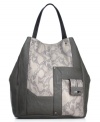 Make this roomy carryall from RACHEL Rachel Roy your new commuter sidekick. It effortlessly fits wallet, phone, eReader and other 9-to-5 essentials without a worry.