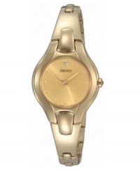 A beautifully pale champagne finish gives this women's watch from Seiko elegant repose. Goldtone stainless steel bracelet and round case. Champagne round dial with logo and diamond accent indices. Quartz movement. Water resistant to 30 meters. Three-year limited warranty. A beautifully pale champagne finish gives this women's watch from Seiko elegant repose. Goldtone stainless steel bracelet and round case. Champagne round dial with logo and diamond accent indices. Quartz movement. Water resistant to 30 meters. Three-year limited warranty.