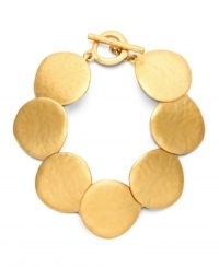 Add luminosity to your look with rich gold tones. Bracelet from the Lauren by Ralph Lauren collection features textured potato chip links with a chic toggle clasp. Crafted in gold tone mixed metal. Approximate length: 7-1/2 inches. Add luminosity to your look with rich gold tones. Bracelet from the Lauren by Ralph Lauren collection features textured potato chip links with a chic toggle clasp. Crafted in gold tone mixed metal. Approximate length: 7-1/2 inches.