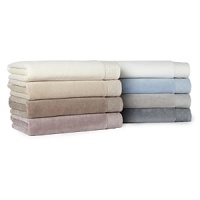 The velour front and absorbent terry cloth back makes this Hudson Park hand towel both beautiful and functional. The velour front and absorbent terry cloth back makes this Hudson Park hand towel both beautiful and functional.