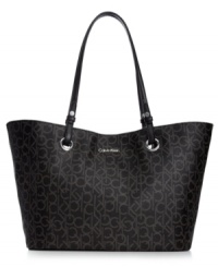 Add some signature style to your purse portfolio with this beautifully embossed bag from Calvin Klein. Stamped with the label's iconic monogram, this perennially chic piece is a must for any logo-loving fashionista. Add some signature style to your purse portfolio with this beautifully embossed bag from Calvin Klein. Stamped with the label's iconic monogram, this perennially chic piece is a must for any logo-loving fashionista.