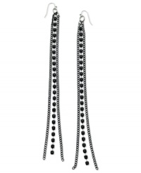 Postmodern chic. This pair of linear earrings from GUESS is crafted from hematite-tone mixed metal with glass crystal stones raising the bar on style. Approximate drop: 7 inches. Postmodern chic. This pair of linear earrings from GUESS is crafted from hematite-tone mixed metal with glass crystal stones raising the bar on style. Approximate drop: 7 inches.