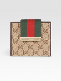Wallet with engraved gucci script logo in GG fabric with leather trim, signature web, and light goldtone hardware.Snap closure Six card slots One bill compartment coin pocket Fully lined 4¾W X 4H X ¾D Made in Italy Wallet with engraved gucci script logo in GG fabric with leather trim, signature web, and light goldtone hardware.Snap closure Six card slots One bill compartment coin pocket Fully lined 4¾W X 4H X ¾D Made in Italy