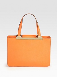 This structured lady-like carryall imparts thoughts of spring's new minimalism in ultra-rich Saffiano leather. Double top handles, 7½ dropMagnetic snap closureProtective metal feetOne inner zip compartmentOne inside zip pocketFour inside open pocketsLogo-printed lining13¼W X 9H X 4½DImported This structured lady-like carryall imparts thoughts of spring's new minimalism in ultra-rich Saffiano leather. Double top handles, 7½ dropMagnetic snap closureProtective metal feetOne inner zip compartmentOne inside zip pocketFour inside open pocketsLogo-printed lining13¼W X 9H X 4½DImported