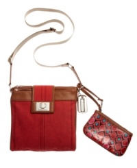 The Tignanello Utility II crossbody is the epitome of city-chic style. Throw it on for an easy way to keep you organized for a long day of shopping or simply roaming the city streets. The Tignanello Utility II crossbody is the epitome of city-chic style. Throw it on for an easy way to keep you organized for a long day of shopping or simply roaming the city streets.