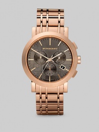 A standard-bearer of gentlemanly style, designed with a taupe dial and three-eye chronograph functionality on a check-inspired link bracelet. Round bezel Quartz movement Three-eye chronograph functionality Water resistant to 5 ATM Date function at 4 o'clock Second hand Stainless steel case: 40mm (1.57) Link bracelet: 20mm (0.79) Deployment clasp Made in Switzerland A standard-bearer of gentlemanly style, designed with a taupe dial and three-eye chronograph functionality on a check-inspired link bracelet. Round bezel Quartz movement Three-eye chronograph functionality Water resistant to 5 ATM Date function at 4 o'clock Second hand Stainless steel case: 40mm (1.57) Link bracelet: 20mm (0.79) Deployment clasp Made in Switzerland