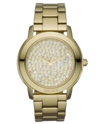 Like shimmering stones at the bottom of the sea, this golden watch from DKNY is timeless and pure. Crafted of gold ion-plated stainless steel bracelet and oval case with logo at bezel. Dial features 106 gold tone crystal accents and three hands. Quartz movement. Water resistant to 50 meters. Two-year limited warranty. Like shimmering stones at the bottom of the sea, this golden watch from DKNY is timeless and pure. Crafted of gold ion-plated stainless steel bracelet and oval case with logo at bezel. Dial features 106 gold tone crystal accents and three hands. Quartz movement. Water resistant to 50 meters. Two-year limited warranty.