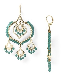 Be boldly bohemian in these pair of striking crystal-decked chandelier earrings from Aqua. Designed to dangle and dazzle, they hint at free-spirited chic. Be boldly bohemian in these pair of striking crystal-decked chandelier earrings from Aqua. Designed to dangle and dazzle, they hint at free-spirited chic.