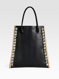 A modern and avant-garde brand with beautifully-crafted pieces such as this luxurious leather design embellished with sparkling stones and studs with contrasting trim.Top handles, 11 dropOpen topInside pocketFully lined11½W X 13½H X 3¾DMade in Italy A modern and avant-garde brand with beautifully-crafted pieces such as this luxurious leather design embellished with sparkling stones and studs with contrasting trim.Top handles, 11 dropOpen topInside pocketFully lined11½W X 13½H X 3¾DMade in Italy