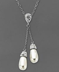 Twice the elegance. Two polished crystal teardrops adorn Kaleidoscope's stunning lariat pendant necklace. Crafted in sterling silver with Swarovski Elements. Approximate length: 18 inches. Approximate drop: 1-9/10 inches. Twice the elegance. Two polished crystal teardrops adorn Kaleidoscope's stunning lariat pendant necklace. Crafted in sterling silver with Swarovski Elements. Approximate length: 18 inches. Approximate drop: 1-9/10 inches.