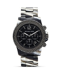 Show your sporty stripes with this acetate and stainless steel watch from MICHAEL Michael Kors. With an exotic look and sleek design, this piece is a must for the urbane adventurer. Show your sporty stripes with this acetate and stainless steel watch from MICHAEL Michael Kors. With an exotic look and sleek design, this piece is a must for the urbane adventurer.
