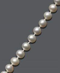 The perfect gift of timeless elegance. Bracelet features a pretty strand of cultured freshwater pearls (6-6-1/2 mm) set in 14k gold. Approximate length: 7-1/2 inches. The perfect gift of timeless elegance. Bracelet features a pretty strand of cultured freshwater pearls (6-6-1/2 mm) set in 14k gold. Approximate length: 7-1/2 inches.