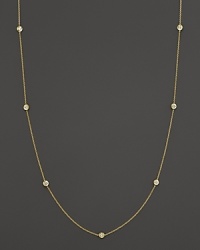 Diamond stations punctuate a long, elegant 18K yellow gold chain. By Roberto Coin. Diamond stations punctuate a long, elegant 18K yellow gold chain. By Roberto Coin.