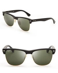 These Ray-Ban sunglasses exude classic cool, with mixed media frames surrounding smoky lenses. These Ray-Ban sunglasses exude classic cool, with mixed media frames surrounding smoky lenses.