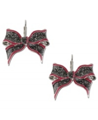 The perfect finishing touch to a lovely package. Betsey Johnson's drop earrings pretty up your look with a bow silhouette embellished with black and pink accents. Crafted in silver tone mixed metal. Approximate drop: 1 inch. The perfect finishing touch to a lovely package. Betsey Johnson's drop earrings pretty up your look with a bow silhouette embellished with black and pink accents. Crafted in silver tone mixed metal. Approximate drop: 1 inch.