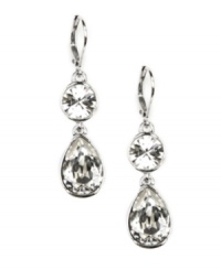 Two of a kind: A dazzling duo of round and pear-shaped crystals illuminate Givenchy's double-drop earrings. Crafted in silver tone mixed metal, they'll look equally chic for day or night. Approximate drop: 1-3/4 inches. Two of a kind: A dazzling duo of round and pear-shaped crystals illuminate Givenchy's double-drop earrings. Crafted in silver tone mixed metal, they'll look equally chic for day or night. Approximate drop: 1-3/4 inches.