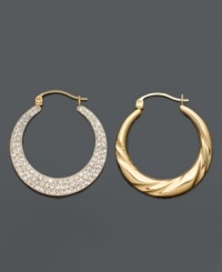 These hoop earrings perform double duty. One side showcases thick, molded 14k gold; the other glimmers with round-cut crystal accents. Approximate diameter: 1-1/10 inches. These hoop earrings perform double duty. One side showcases thick, molded 14k gold; the other glimmers with round-cut crystal accents. Approximate diameter: 1-1/10 inches.