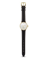 Take a classic approach to accessorizing with this leather strap watch from kate spade new york. With a gold-plated case and Mother-of-Pear dial, it's a timeless choice. Take a classic approach to accessorizing with this leather strap watch from kate spade new york. With a gold-plated case and Mother-of-Pear dial, it's a timeless choice.