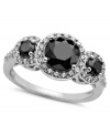 Precision style with a hint of sparkle. Arabella's stunning three-stone ring combines round-cut black (2-7/8 ct. t.w.) and white (3/4 ct. t.w.) Swarovski zirconias in a pretty circular pattern. Set in sterling silver. Size 7.