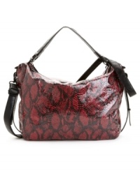 Rock this season's hottest trend with this croc-embossed bag from BCBGeneration. The slouchy-sleek design is outfitted with subtle silvertone hardware, while the roomy interior offers zip compartments and plenty of pockets for all your essentials. Rock this season's hottest trend with this croc-embossed bag from BCBGeneration. The slouchy-sleek design is outfitted with subtle silvertone hardware, while the roomy interior offers zip compartments and plenty of pockets for all your essentials.