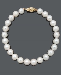 Excellence and luxury combine in this polished strand. Grade A+, cultured freshwater pearls (7-1/2-8 mm) shine against a 14k gold clasp. Approximate length: 8 inches.