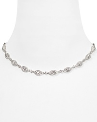 All-around pavé-adorned crystal stations impart elegant allure to this Nadri necklace, refined in rhodium-plated metal. All-around pavé-adorned crystal stations impart elegant allure to this Nadri necklace, refined in rhodium-plated metal.