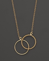 Dazzling interlocking circles of 14K yellow gold. Dazzling interlocking circles of 14K yellow gold.