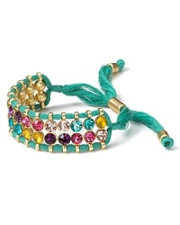 Aqua combines faceted crystals and colored rope to create a cool contrast. Resist the urge to layer, this bracelet shines on its own. Aqua combines faceted crystals and colored rope to create a cool contrast. Resist the urge to layer, this bracelet shines on its own.