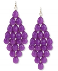 Perfectly pretty in purple. These chandelier earrings from Haskell flaunt a diamond design with clusters of purple acrylic beads in faceted teardrop shapes. Crafted in gold tone mixed metal. Approximate drop: 3-3/4 inches. Perfectly pretty in purple. These chandelier earrings from Haskell flaunt a diamond design with clusters of purple acrylic beads in faceted teardrop shapes. Crafted in gold tone mixed metal. Approximate drop: 3-3/4 inches.