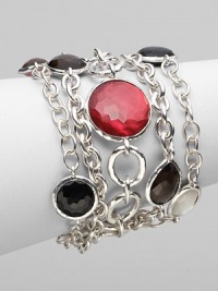 From the Wonderland Collection. A dramatic, 5-strand design with clear quartz, mother-of-pearl accents and onyx stones set in sterling silver.Clear quartz, mother-of-pearl, onyx Sterling silver Length, 7¾ Clasp closure Imported From the Wonderland Collection. A dramatic, 5-strand design with clear quartz, mother-of-pearl accents and onyx stones set in sterling silver.Clear quartz, mother-of-pearl, onyx Sterling silver Length, 7¾ Clasp closure Imported