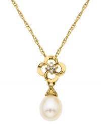 Make a stunning statement. This pendant, crafted from 10k gold, features a beautiful cultured freshwater pearl (8-10 mm) and diamond accents for a sparkling touch. Approximate length: 18 inches. Approximate drop: 9/10 inch. Make a stunning statement. This pendant, crafted from 10k gold, features a beautiful cultured freshwater pearl (8-10 mm) and diamond accents for a sparkling touch. Approximate length: 18 inches. Approximate drop: 9/10 inch.