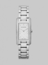 A chic style with an iconic check stamped dial. Quartz movementWater resistant to 3 ATMRectangular stainless steel case, 20mm (.78) X 26mm (1)Smooth bezelCheck stamped dialBar hour markersSecond hand Stainless steel link braceletMade in Switzerland A chic style with an iconic check stamped dial. Quartz movementWater resistant to 3 ATMRectangular stainless steel case, 20mm (.78) X 26mm (1)Smooth bezelCheck stamped dialBar hour markersSecond hand Stainless steel link braceletMade in Switzerland