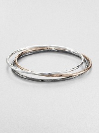 A beautiful blend of three stunning bangles in a chic, hammered texture. Sterling silverBlackened sterling silverSterling silver and 18k gold with 18k rose goldplatingDiameter, about 2.5Slip-on styleImported 