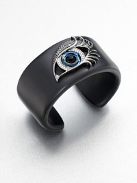 From the Envy Collection. The eyes have it in this striking cuff of jet black resin, dramatically adorned with a sweeping silver-outlined eye that gazes and glitters intently, set with cubic zirconia and black onyx.Black onyxBlack, white and blue cubic zirconiaSterling silverResinDiameter, about 2.25Imported From the Envy Collection. The eyes have it in this striking cuff of jet black resin, dramatically adorned with a sweeping silver-outlined eye that gazes and glitters intently, set with cubic zirconia and black onyx.Black onyxBlack, white and blue cubic zirconiaSterling silverResinDiameter, about 2.25Imported