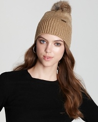 Shine on in MICHAEL Michael Kors' rabbit pom hat with glints of gold or silver, and a front logo plate. Shine on in MICHAEL Michael Kors' rabbit pom hat with glints of gold or silver, and a front logo plate.