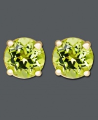 The perfect drop of color to spruce up your style. Earrings feature round-cut peridots (1 ct. t.w.) in a 14k gold post setting. Approximate diameter: 1/4 inch. The perfect drop of color to spruce up your style. Earrings feature round-cut peridots (1 ct. t.w.) in a 14k gold post setting. Approximate diameter: 1/4 inch.