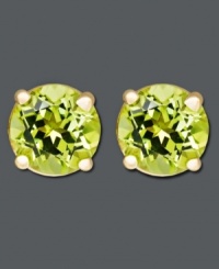 The perfect drop of color to spruce up your style. Earrings feature round-cut peridots (1 ct. t.w.) in a 14k gold post setting. Approximate diameter: 1/4 inch.