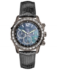 Go for dazzling accents with this chic and functional watch from GUESS. Go for dazzling accents with this chic and functional watch from GUESS.