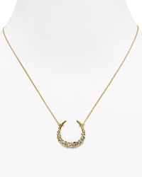 Catch good luck in this glittering 18 Kt. gold plate horseshoe, encrusted with starry Swarovski crystals. By Alexis Bittar. Catch good luck in this glittering 18 Kt. gold plate horseshoe, encrusted with starry Swarovski crystals. By Alexis Bittar.