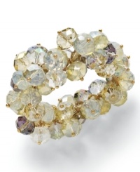 Clusters of captivating ornaments for the season! Slip on c.A.K.e. by Ali Khan's stretchable bracelet, with enchanting opal color glass beads. Crafted in gold tone mixed metal. Approximate diameter: 2-1/4 inches. Clusters of captivating ornaments for the season! Slip on c.A.K.e. by Ali Khan's stretchable bracelet, with enchanting opal color glass beads. Crafted in gold tone mixed metal. Approximate diameter: 2-1/4 inches.