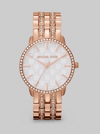 The warm glow of goldtone over stainless steel is rich and elegant, spiced with sparkles around the bezel and link bracelet.Quartz movementWater resistant to 10 ATMRose goldtone-finished round case, 35mm diameter (1.4)Crystal bezelWhite MK logo dialRose goldtone bar hour markersSecond handRose goldtone link bracelet with crystalsImported The warm glow of goldtone over stainless steel is rich and elegant, spiced with sparkles around the bezel and link bracelet.Quartz movementWater resistant to 10 ATMRose goldtone-finished round case, 35mm diameter (1.4)Crystal bezelWhite MK logo dialRose goldtone bar hour markersSecond handRose goldtone link bracelet with crystalsImported
